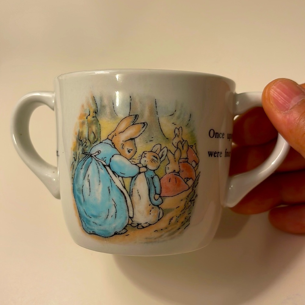 Vintage Wedgwood Beatrix potter ceramic two-holder nursery cup.